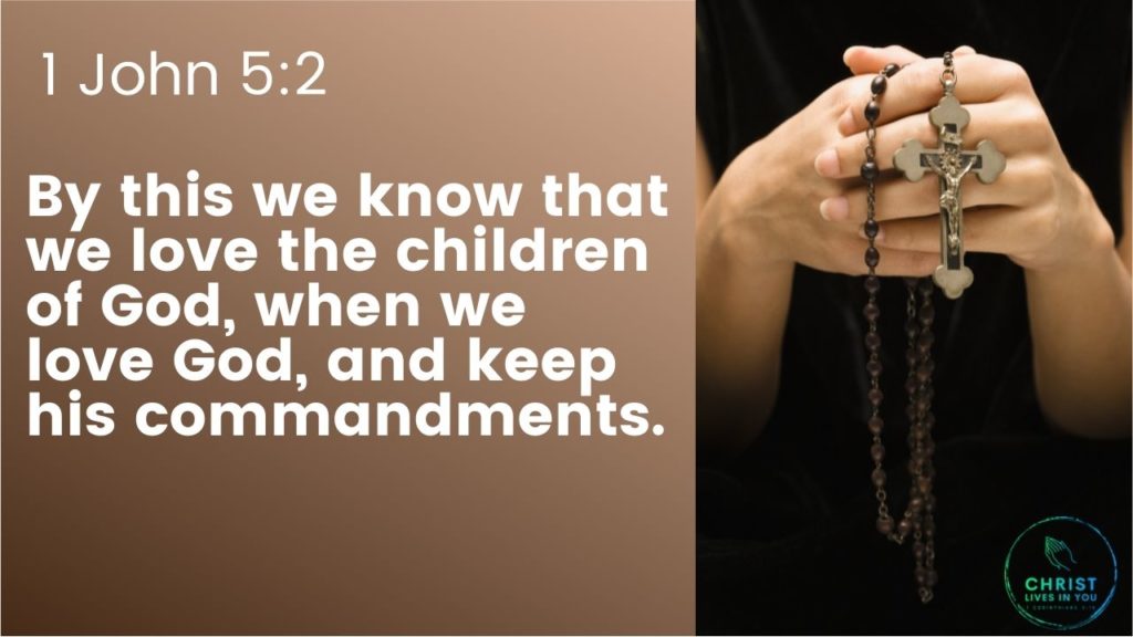 A woman holds a rosary