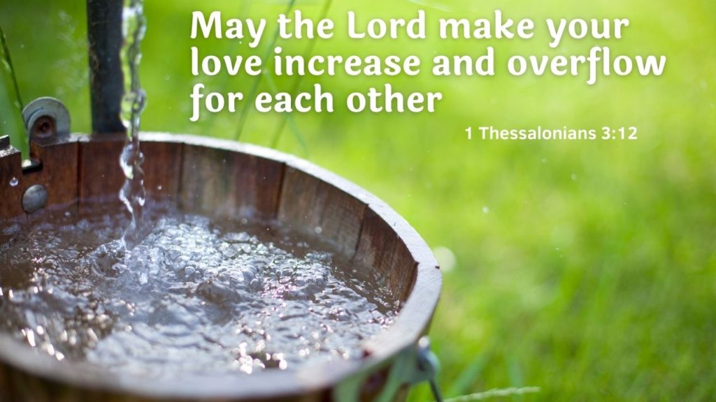 Water pouring into a bucket and overflowing