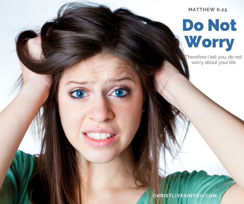 Woman pulls on her hair with a worried look on her face