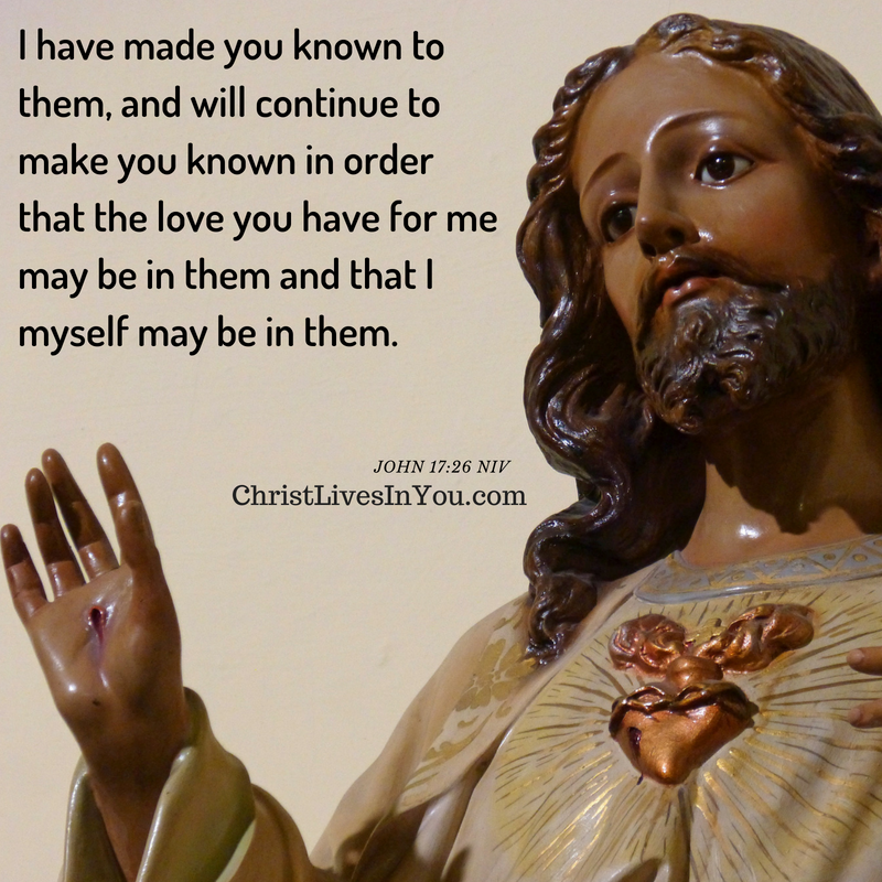 An image of Jesus with His sacred heart and hand upraised